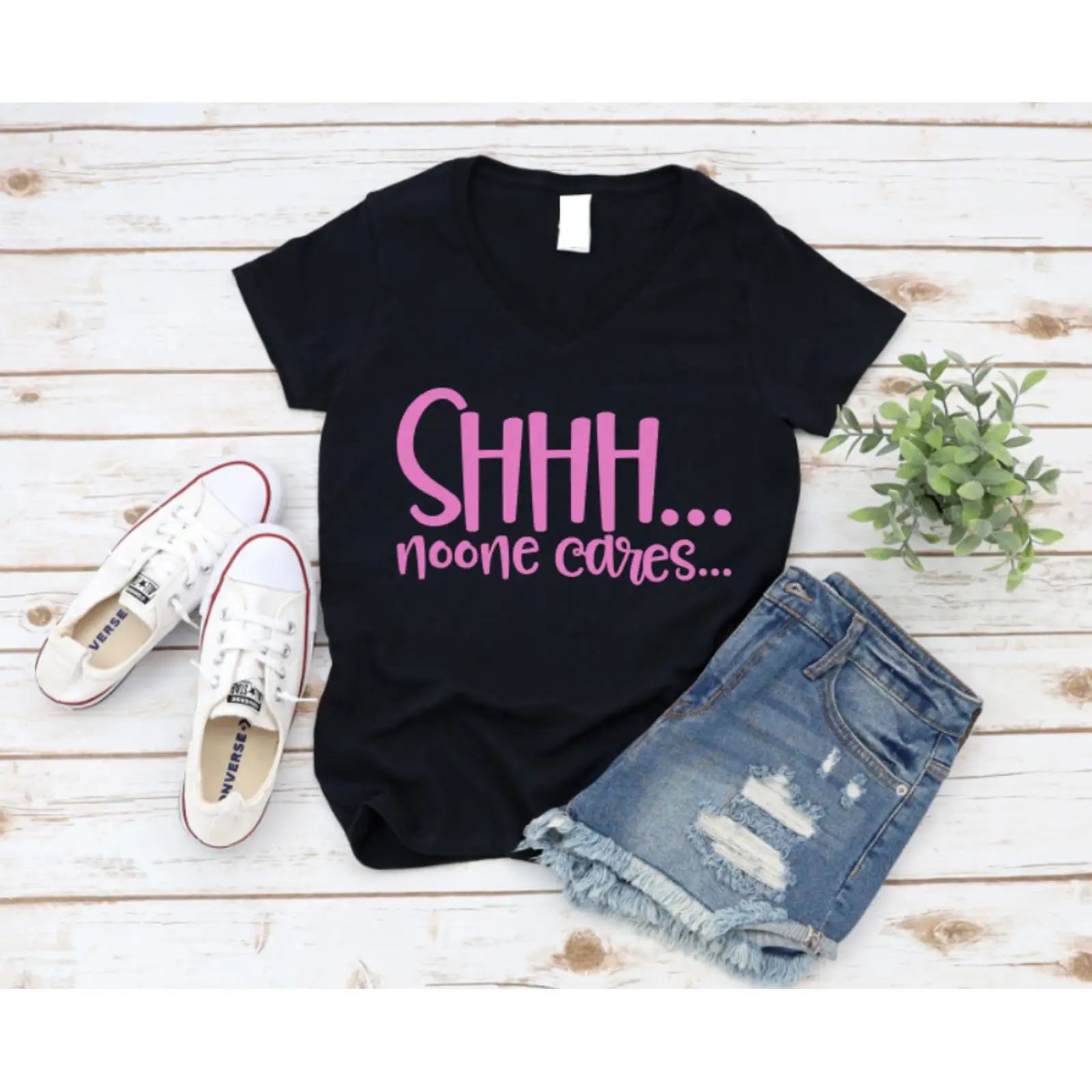 Black t shirt with pink text ' - On Sneaker Care ulasan dan harga
